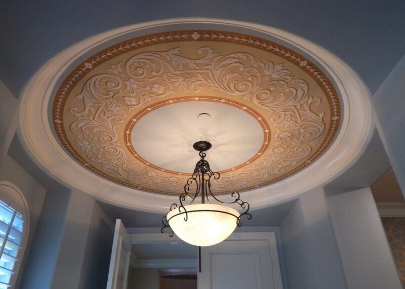 Medallion painted on thin material and installed